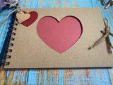A5 kraft scrapbook with heart aperture and raspberry red pages for decorating 5 x 8 inches - seconds sale