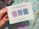 First birthday card grandson, our amazing grandson is one happy birthday card