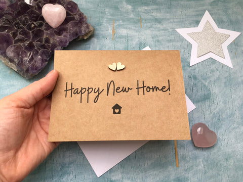 Happy new home card with mini wooden hearts