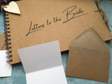 mini envelope guestbook, rustic guest book with mini envelopes for bridal shower, letters to the bride scrapbook album